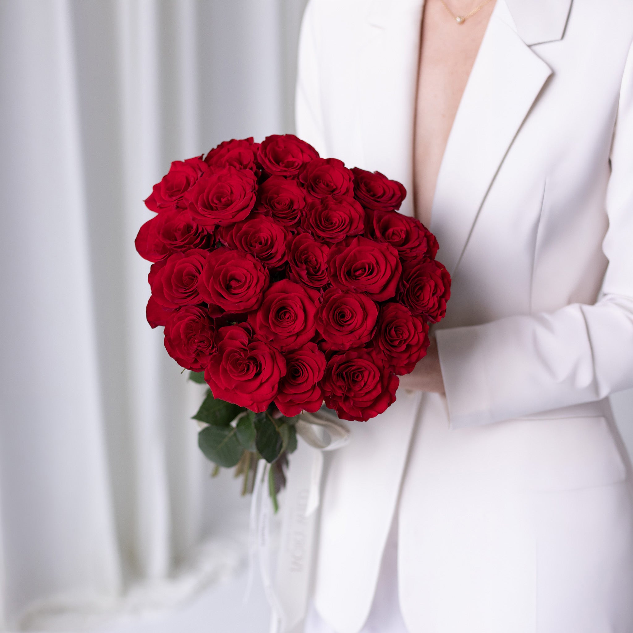 Handcrafted red rose bouquet by Ivory Wild Austin florist