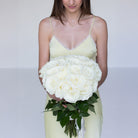 Handcrafted white rose bouquet by Ivory Wild Austin florist